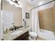Bathroom featuring granite vanity, neutral ceramic tile, and a shower-tub combination at 4345 Idlewood Dr, Cumming, GA 30040