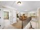 Spacious hallway with natural light, offering versatile access to living areas and bedrooms on the second floor at 4345 Idlewood Dr, Cumming, GA 30040