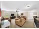 Inviting living room showcasing a media center, ample seating, and a tranquil view of the outdoors at 4345 Idlewood Dr, Cumming, GA 30040