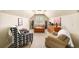 Cozy attic retreat with modern furniture, decorative artwork, and natural lighting, a perfect relaxation spot at 4345 Idlewood Dr, Cumming, GA 30040