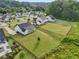 Spacious homes in a lush green community offer peaceful suburban living with large, fenced-in backyard and mature trees at 4720 Down Setting Rd, Cumming, GA 30028