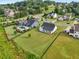 Expansive backyard and inviting pool complement this well-maintained home in a desirable community with landscaped lawn at 4720 Down Setting Rd, Cumming, GA 30028