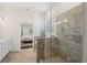 Bathroom featuring a large shower with gray tile and a view of the main bedroom at 4720 Down Setting Rd, Cumming, GA 30028