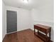 Bedroom featuring hardwood floors, neutral paint, and a hall closet at 4720 Down Setting Rd, Cumming, GA 30028