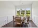 Cozy dining room with wood floors and chandelier at 4720 Down Setting Rd, Cumming, GA 30028