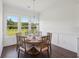 Dining room with natural light and traditional charm at 4720 Down Setting Rd, Cumming, GA 30028