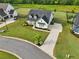 Well-maintained farmhouse with a long driveway, lush lawn and beautifully landscaped front yard at 4720 Down Setting Rd, Cumming, GA 30028