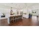 This bright, open kitchen has a large island and plenty of cabinet space at 4720 Down Setting Rd, Cumming, GA 30028