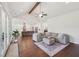 Spacious living room open to kitchen with hardwood floors at 4720 Down Setting Rd, Cumming, GA 30028