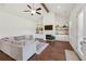 Vaulted ceiling in living room, fireplace with built ins and wood floors at 4720 Down Setting Rd, Cumming, GA 30028
