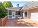 Enjoy this wooden back deck, perfect for entertaining with view into screened porch at 1360 Mount Mickinley Dr, Grayson, GA 30017