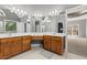 Primary bathroom suite featuring a double sink vanity, ceiling fan, and vanity space at 1360 Mount Mickinley Dr, Grayson, GA 30017