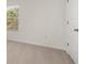 Bright bedroom with neutral carpet and a window providing natural light at 1383 Van Allen Ct, Dacula, GA 30019