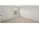 Bright bedroom with neutral carpet and a window providing natural light at 1383 Van Allen Ct, Dacula, GA 30019