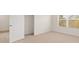 Bedroom featuring neutral carpet, and a large window at 1383 Van Allen Ct, Dacula, GA 30019
