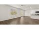 Open-concept living room with hardwood floors and a walkout to a private patio at 1383 Van Allen Ct, Dacula, GA 30019