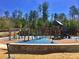 A colorful and inviting playground with climbing structures and a soft surface, perfect for  at 1383 Van Allen Ct, Dacula, GA 30019