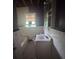 Classic bathroom with a tub, white tile, and vintage fixtures, waiting for your personal touch at 1722 Donnalee Se Ave, Atlanta, GA 30316