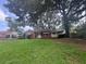 This home has a well-maintained lawn and mature trees providing a shady landscape at 1722 Donnalee Se Ave, Atlanta, GA 30316