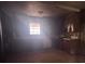This is the kitchen with worn cabinets and countertops, but a window that provides natural light at 1722 Donnalee Se Ave, Atlanta, GA 30316