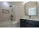Bathroom with a walk-in shower, modern vanity, and neutral wall color at 3207 Bold Springs Rd, Dacula, GA 30019