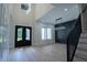 Open concept entryway with decorative trim and hardwood floors at 3207 Bold Springs Rd, Dacula, GA 30019