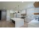 Gourmet kitchen with an oversized island, professional-grade appliances, and custom cabinetry at 3207 Bold Springs Rd, Dacula, GA 30019