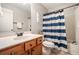 Bathroom featuring vanity with updated fixtures and tiled shower and bathtub at 429 Mountain View Ln, Woodstock, GA 30188