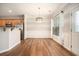 Dining area with stylish lighting, showcasing hardwood floors and providing an elegant dining experience at 429 Mountain View Ln, Woodstock, GA 30188