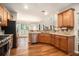 Modern kitchen with stainless steel appliances and wooden cabinetry, offering functionality and style at 429 Mountain View Ln, Woodstock, GA 30188