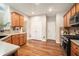 Well-lit kitchen featuring wood cabinets, stainless steel appliances, and lots of counter space at 429 Mountain View Ln, Woodstock, GA 30188