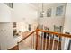 Open-concept living room with high ceilings, lots of natural light, and beautiful wood floors at 429 Mountain View Ln, Woodstock, GA 30188