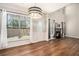 Bright and airy living room with fireplace and large windows, offering ample light and modern style at 429 Mountain View Ln, Woodstock, GA 30188