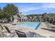 Community pool area with seating for residents at 429 Mountain View Ln, Woodstock, GA 30188
