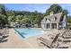 A large pool with lounge chairs at 429 Mountain View Ln, Woodstock, GA 30188