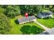 Aerial view of a well-maintained home with a large, green front yard at 2454 Fairway Sw Cir, Atlanta, GA 30331