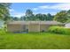 Backyard featuring a well-maintained lawn and a patio at 2454 Fairway Sw Cir, Atlanta, GA 30331