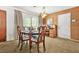 Dining area with a classic wood table set, and a view of the adjacent workstation at 2454 Fairway Sw Cir, Atlanta, GA 30331
