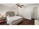 Bedroom with natural light features wood floors, a ceiling fan, and cozy furnishings at 2703 Country Park Dr, Smyrna, GA 30080