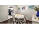 Charming dining room featuring a modern table, hardwood floors and a view into the kitchen at 2703 Country Park Dr, Smyrna, GA 30080