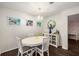 Cozy dining room features hardwood floors, modern decor and ample light at 2703 Country Park Dr, Smyrna, GA 30080