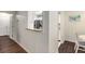 Kitchen pass through with granite counters connects to a dining area and offers a peek into the well-lit kitchen space at 2703 Country Park Dr, Smyrna, GA 30080