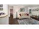 Inviting living room adjacent to kitchen area offers space for relaxation, with access to various areas of the home at 2703 Country Park Dr, Smyrna, GA 30080