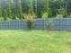 Large fenced-in backyard offering privacy and plenty of room for outdoor activities at 4480 Merrigold Way, Fairburn, GA 30213