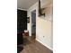 Bright office space with dark wood desk, modern wall art, and comfortable seating at 4480 Merrigold Way, Fairburn, GA 30213