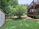 Large grassy backyard with storage shed at 1131 Steeple Run, Lawrenceville, GA 30043