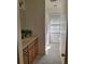 Neutral bathroom featuring a vanity, and a shower/tub combo with window at 1131 Steeple Run, Lawrenceville, GA 30043
