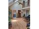 Open living room boasts soaring ceilings, hardwood floors, and an open view of the upper level at 1131 Steeple Run, Lawrenceville, GA 30043
