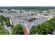 Aerial view of a well-maintained apartment complex, showing the building's layout and parking area at 1850 Cotillion Dr Unit 3416, Atlanta, GA 30338