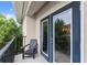Relaxing outdoor balcony featuring a chair and views of the surrounding trees and natural light at 1850 Cotillion Dr Unit 3416, Atlanta, GA 30338